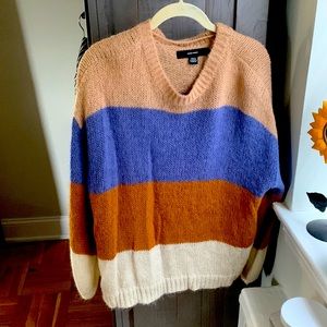 Cute striped sweater with beige, purple, rust and white lines